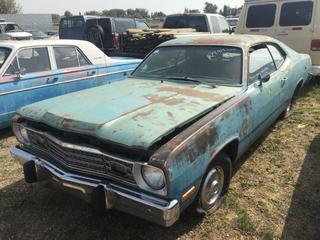 Selling Off-Site - 527 North 200 East, Raymond, AB -  1974 Plymouth Duster c/w Auto Trans, S/N VL29C4B329422