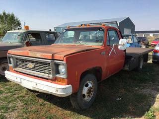 Selling Off-Site - 527 North 200 East, Raymond, AB -  1973 Chev 3500 Deck Truck c/w Manual Trans, S/N CCY3331112341