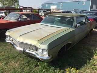 Selling Off-Site - 527 North 200 East, Raymond, AB -  1970 Chev Impala Custom c/w Auto Trans, S/N 1644701109344