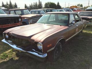Selling Off-Site - 527 North 200 East, Raymond, AB -  1978 Plymouth Volare Car c/w Auto Trans, S/N HH41G7F281276
