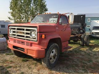 Selling Off-Site - 527 North 200 East, Raymond, AB -  1981 GMC 3 Ton Cab & Chassis. Showing 66,883 kms. S/N 1GBE6D1A1BV110844.