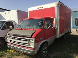 Selling Off-Site - 527 North 200 East, Raymond, AB -  1991 Chev Cube Van c/w V8, Auto, Showing 460,179 kms. S/N 2GBJG31K7M4144000.