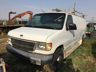 Selling Off-Site - 527 North 200 East, Raymond, AB -  1997 Ford E-350 Cargo Van c/w V8, Auto,  Showing 391,348 kms. S/N 1FTH524L1VHA06525. Note: Contents Sold Separately, Out Of Province Vehicle.