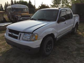 Selling Off-Site - 527 North 200 East, Raymond, AB -  2001 Ford Explorer Sport Truck c/w V8, Auto, S/N 1FMZ067E41VA41463. Note: No Keys, Kms Unknown, Running Condition Unknown.