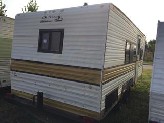 Selling Off-Site - 527 North 200 East, Raymond, AB -  1975 Security T/A  Holiday Trailer  S/N 8151636.