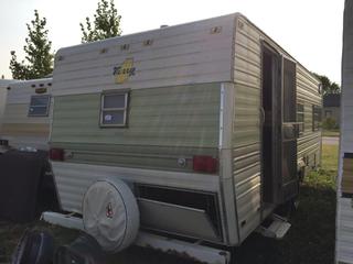 Selling Off-Site - 527 North 200 East, Raymond, AB -  Terry T/A  Holiday Trailer S/N 2464YS2106.