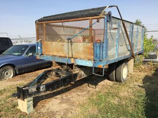 Selling Off-Site - 527 North 200 East, Raymond, AB -  Custombuilt S/A Dual Wheel Tilt Trailer. Note: No Serial Number.