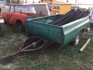 Selling Off-Site - 527 North 200 East, Raymond, AB -  Chev Truck Box Trailer, contents not included.