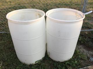 Selling Off-Site - 527 North 200 East, Raymond, AB -  (2) Open Top White Plastic Barrels.