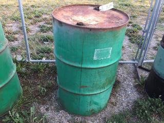 Selling Off-Site - 527 North 200 East, Raymond, AB -  Green 45 Gal. Drum.