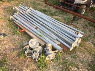 Selling Off-Site - 527 North 200 East, Raymond, AB -  Quantity of Metal Post & (4) Rollers.