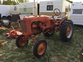 Selling Off-Site - 527 North 200 East, Raymond, AB -  Allis Chalmers CA Antique Tractor. 