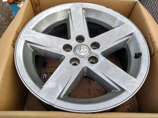 Quantity of (4) Dodge Rims.