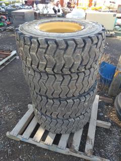 Quantity of (4) Skid Steer Tires & Rims 12-16.5 NHS Nylon.