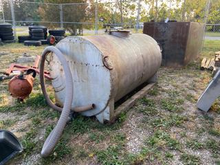 Selling Off-Site - 527 North 200 East, Raymond, AB -  500 Gal. Water Tank on Skids.