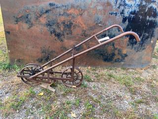 Selling Off-Site - 527 North 200 East, Raymond, AB -  Antique Garden Cultivator.