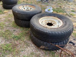 Selling Off-Site - 527 North 200 East, Raymond, AB -  (4) 8 Bolt 16" Truck Rims & Tires.