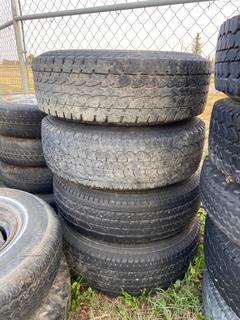 Selling Off-Site - 527 North 200 East, Raymond, AB -  (4) Tires 245 75 16 on 8 Bolt Steel Wheels.