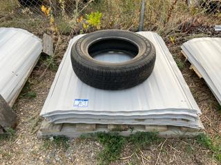 Selling Off-Site - 527 North 200 East, Raymond, AB -  Pallet of Metal Siding. 75 Sheets.