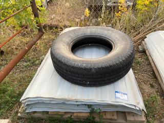 Selling Off-Site - 527 North 200 East, Raymond, AB -  Pallet of Metal Siding. 85 Sheets.