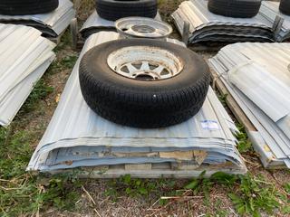 Selling Off-Site - 527 North 200 East, Raymond, AB -  Pallet of Metal Siding. 80 Sheets.