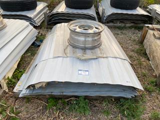 Selling Off-Site - 527 North 200 East, Raymond, AB -  Pallet of Metal Siding. 80 Sheets.