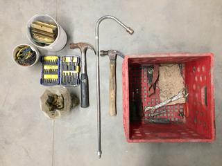 Red Crate Containing Hammers, Irwin Bit Set, & Air Hose Hooked Tip.