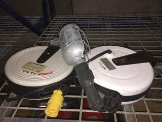 (1) Retractable Cord Work Light & (1) Retractable Extension Cord.