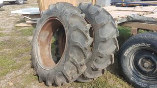 Selling Off-Site - 527 North 200 East, Raymond, AB -  (2) 11.2-24 Tractor Tires.