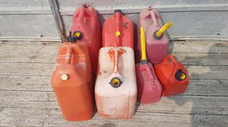 Selling Off-Site - 527 North 200 East, Raymond, AB -  (7) Assorted Plastic Gas Cans.