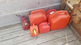 Selling Off-Site - 527 North 200 East, Raymond, AB -  (6) Assorted Plastic Gas Cans.