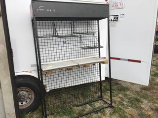 Selling Off-Site - 527 North 200 East, Raymond, AB -  Shelving Display Rack.