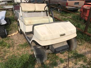 Selling Off-Site - 527 North 200 East, Raymond, AB -  Yamaha Gas Golf Car w/ Utility Box.