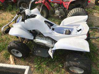Selling Off-Site - 527 North 200 East, Raymond, AB -  Blue Kids Quad. (Parts).