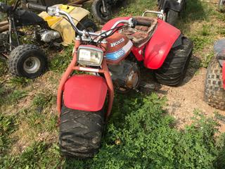 Selling Off-Site - 527 North 200 East, Raymond, AB -  1982 Honda Trike. S/N JH3TB0100CC242277. (Parts).