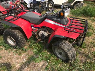 Selling Off-Site - 527 North 200 East, Raymond, AB -  Honda TRX 200 Quad. (Parts).