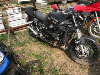 Selling Off-Site - 527 North 200 East, Raymond, AB -  Kawasaki Ninja 1000 S/N JKAZXCA17GA005609. (Parts).