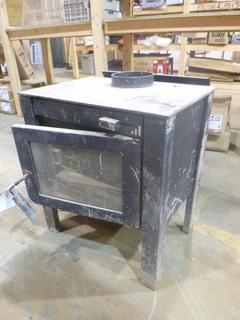 Century Heating Wood Stove, Model S24SE, 20 1/2" x 23" x 26 5/8" (Unused)