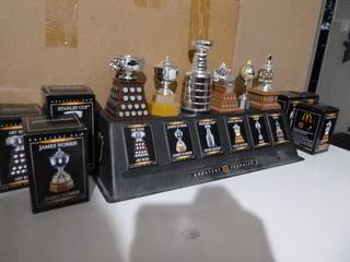Complete Set of (6 of 6) Of McDonald's "Greatest Trophies" Featuring the Stanley Cup Trophy, Hart Trophy, Conn Smythe Trophy, James Norris Trophy, Vezina Trophy and Art Ross Trophy, C/w Display Stand, Original Placards, and Original Packaging / Boxes
