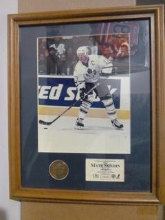 13" x 16"  Framed Mats Sundin 8" x 10" Photo and Solid Brass Toronto Maple Leaf Medallion, Numbered 453