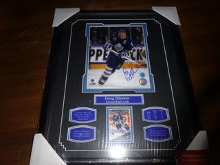 18.5" x 22.5" Framed Signed 8" x 10" Doug Gilmour Toronto Maple Leafs Picture W/ card and 4 Plaques w/ Career Stats and Awards.  Certificate of Authenticity (COA) From AJ Sportscards, Certificate number AJ000466