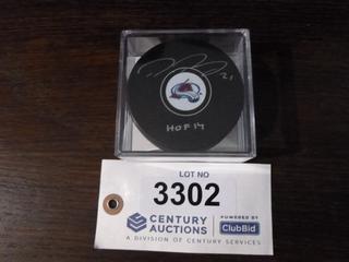 Peter Forsberg Autographed Colorado Avalanche Puck.  C.O.A. From AJ Sports World.  Inscribed "HOF14"