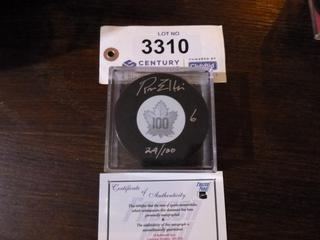 Ron Ellis Toronto Maple Leaf Signed Century Puck, Limited Edition of 100.  Inscribed "6" and "24/100".  C.O.A. From Frozen Pond