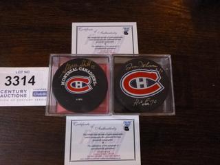 Steve Shutt and Tom Johnson Signed Montreal Canadiens Pucks.  C.O.A. From Frozen Pond.  Inscribed "HOF 70"
