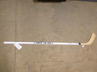 Edmonton Oilers Hockey Stick Signed by 80"s Players - Pouzer, Fogolin, Jackson Etc. *No C.O.A.*  (Located Upstairs)