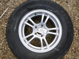 (1) ST 205/75 R15 Tire w/ 15 X 6J Mag Rim *Unused*