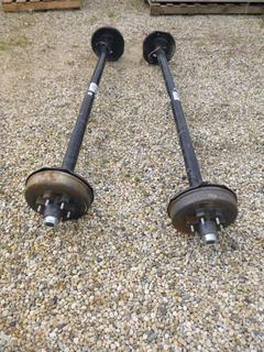 Pair Of 5100lb Axles C/w Brakes And Hubs *Note: One Spindle Has Damage*
