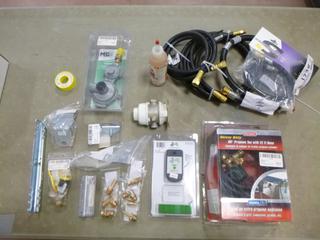 Qty Of Propane Related Parts Includes: LPG Double Tank Sensor Kit, Propane Tee w/ 12ft Hose, 2 1/4in 10ft Hose, 1 1/2in Hose, 20in Pigtail And (2) Regulators