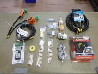 Qty Of Assorted Propane Related Parts Includes: LPG Double Tank Sensors w/ Monitor, Propane Tee w/ 12ft Hose, Regulators, Hoses And Couplers And Fittings