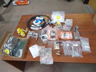 Qty Of Assorted Trailer Parts Includes: Atwood Circuit Board, Airxcel Module Board Adaptor Kit, Appliance Circuit Board, Furrion Back Up Camera, 2 1/4in Propane Hoses And Misc Supplies